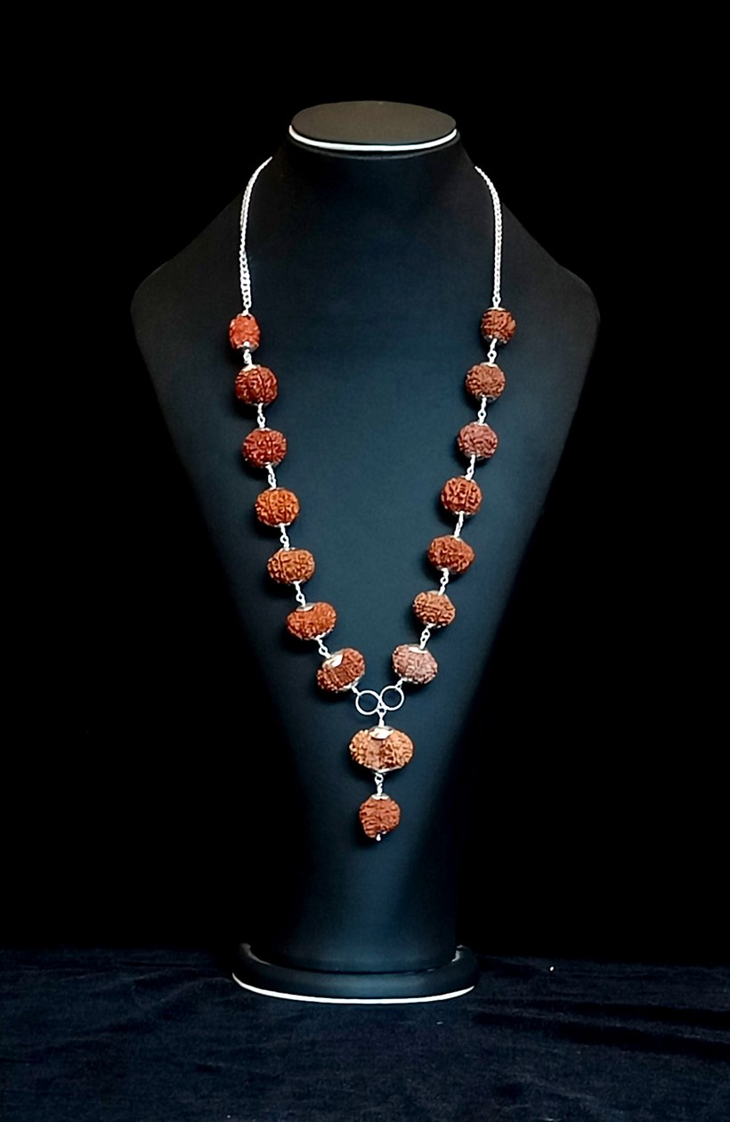 Regular Siddha Mala shown on a display bust